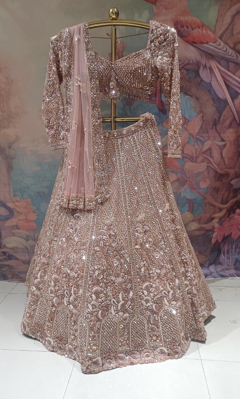 Rose Gold Bridal Lehenga with Heavy Zardozi and Sequin Hand Work.