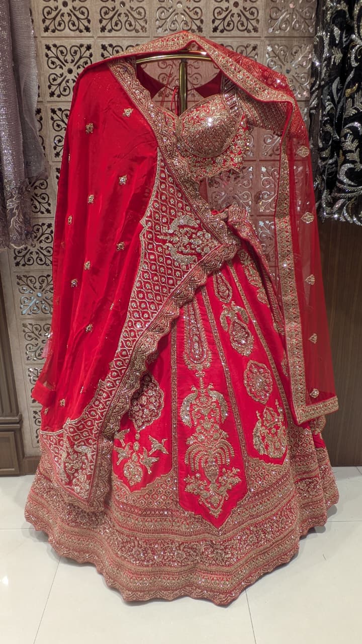 Crimson Red Silk Bridal Lehenga with Heavy Zardozi & Panel Work.