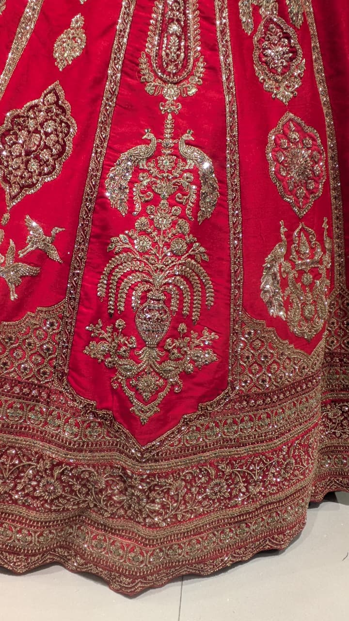 Crimson Red Silk Bridal Lehenga with Heavy Zardozi & Panel Work.