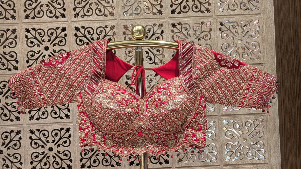 Crimson Red Silk Bridal Lehenga with Heavy Zardozi & Panel Work.