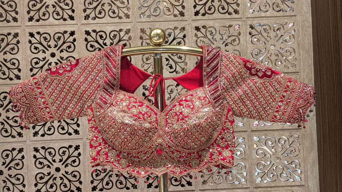 Crimson Red Silk Bridal Lehenga with Heavy Zardozi & Panel Work.