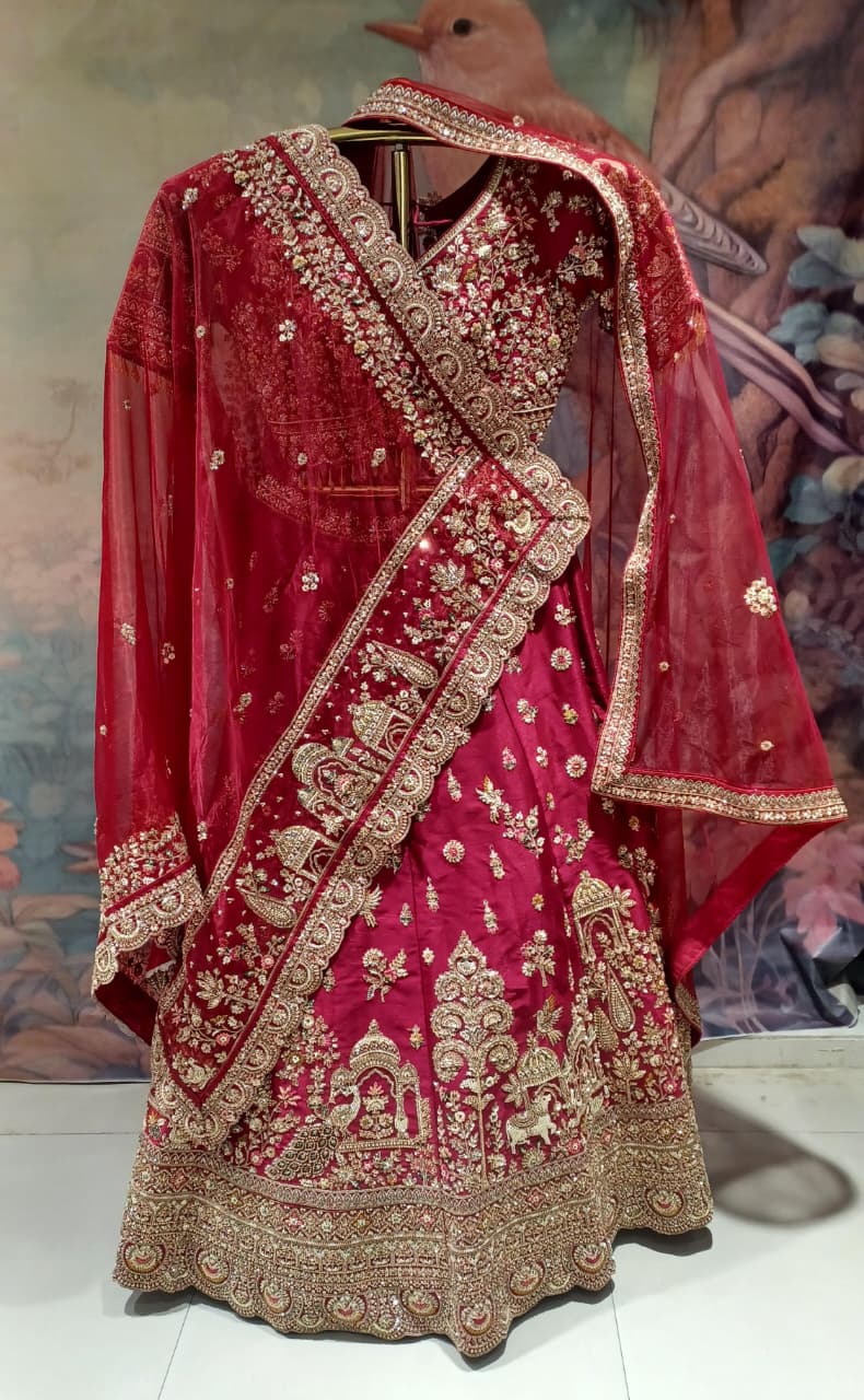 Premium Fuchsia-Maroon Bridal Lehenga with Detailed Scalloped Borders.