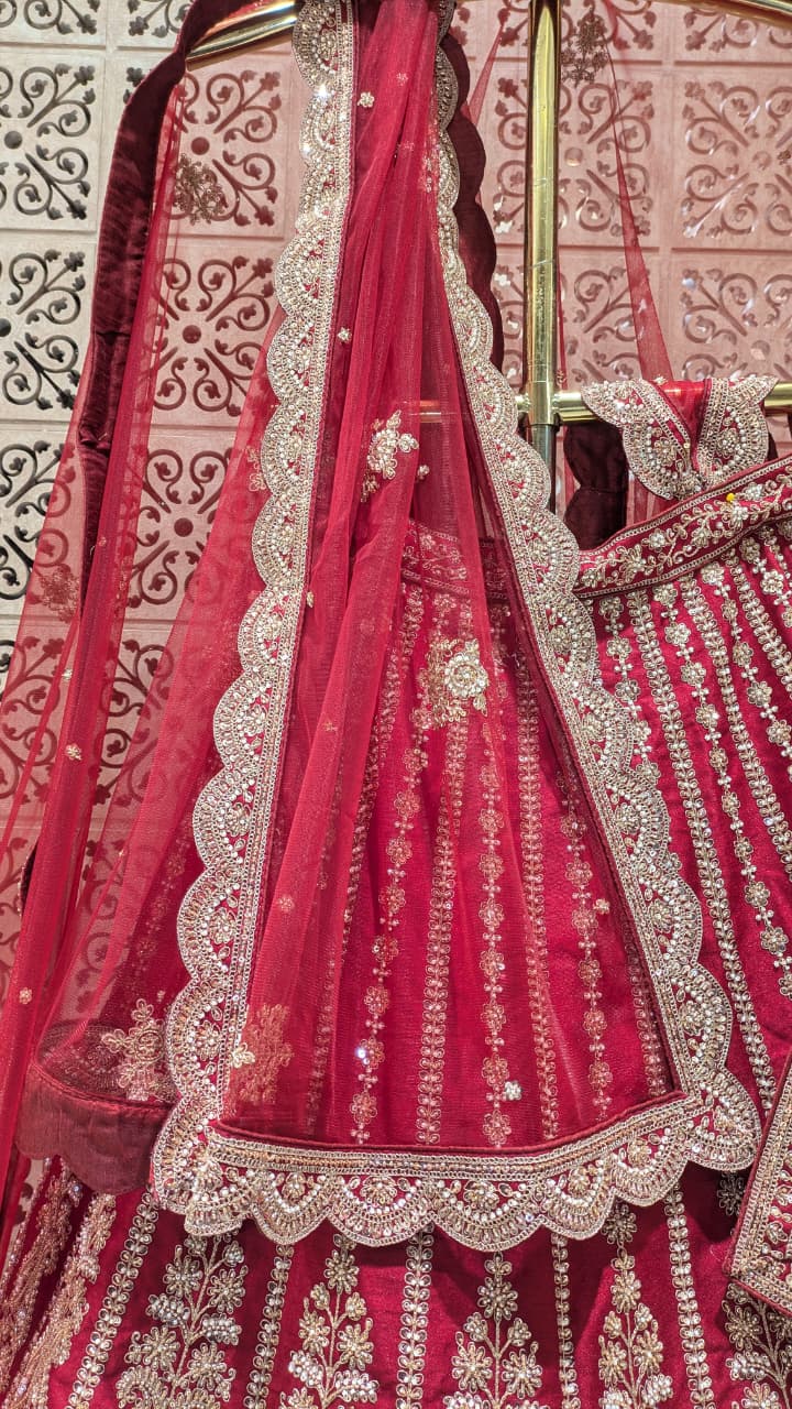 Unstitched Crimson Red Silk Bridal Lehenga with Scalloped Archway Borders.