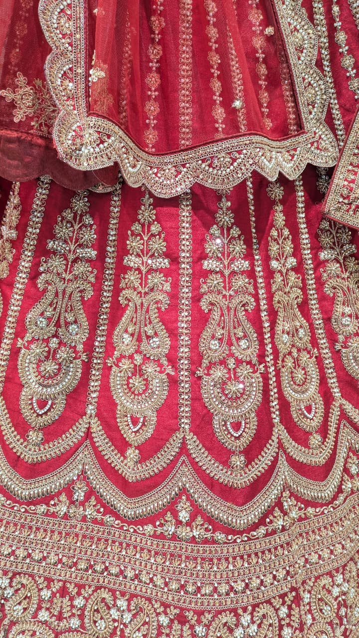 Unstitched Crimson Red Silk Bridal Lehenga with Scalloped Archway Borders.