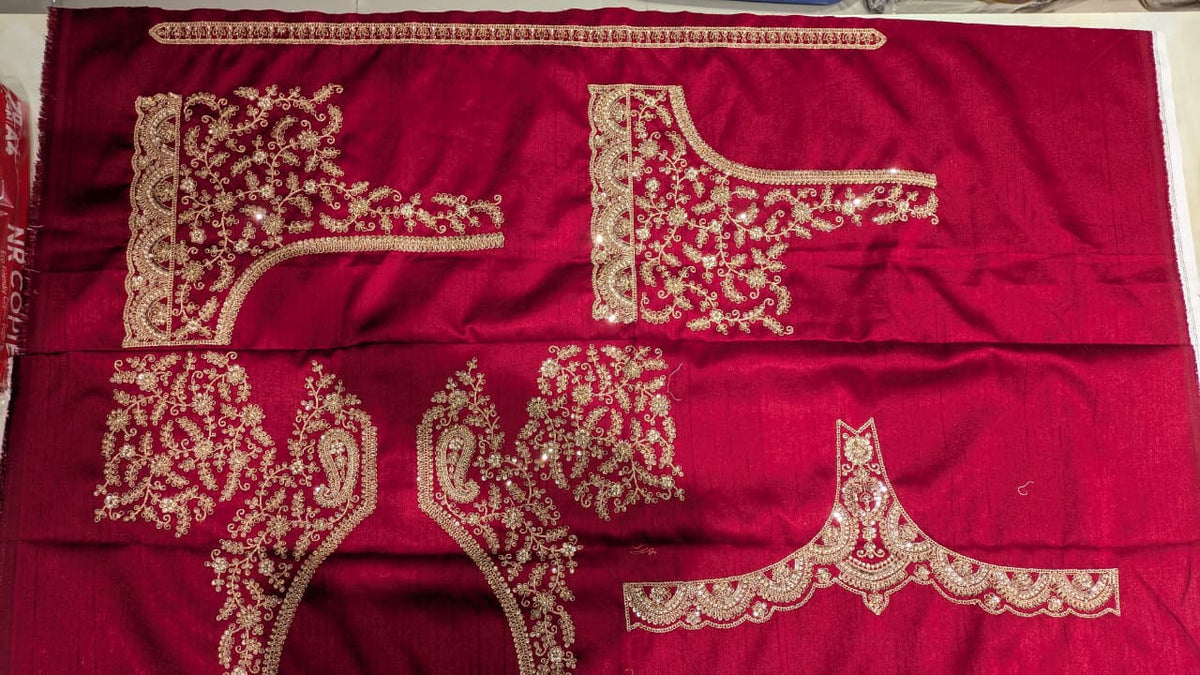 Unstitched Crimson Red Silk Bridal Lehenga with Scalloped Archway Borders.