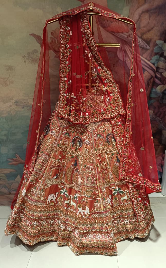 Unstitched Rust-Orange & Crimson Silk Bridal Lehenga with Pichwai Motif Hand Embroidery.