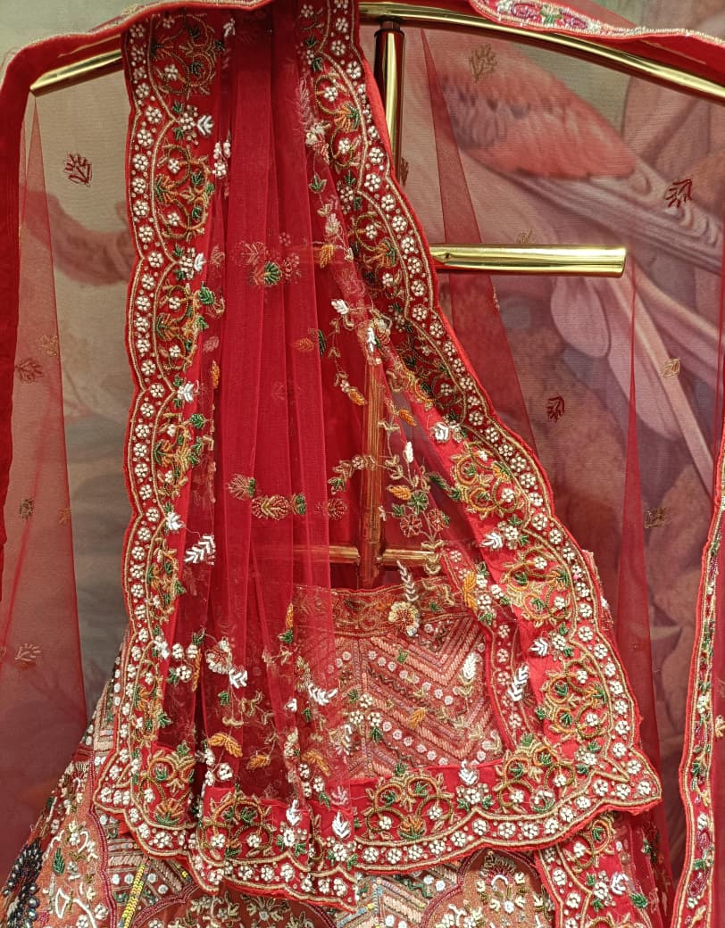 Unstitched Rust-Orange & Crimson Silk Bridal Lehenga with Pichwai Motif Hand Embroidery.
