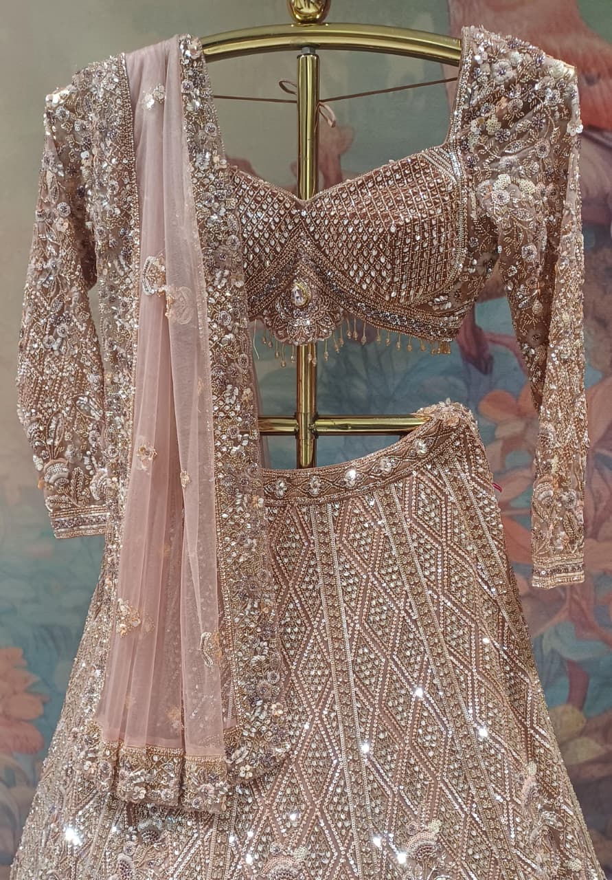 Rose Gold Bridal Lehenga with Heavy Zardozi and Sequin Hand Work.