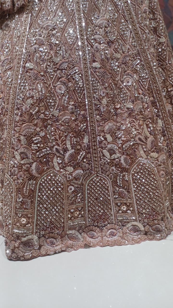 Rose Gold Bridal Lehenga with Heavy Zardozi and Sequin Hand Work.
