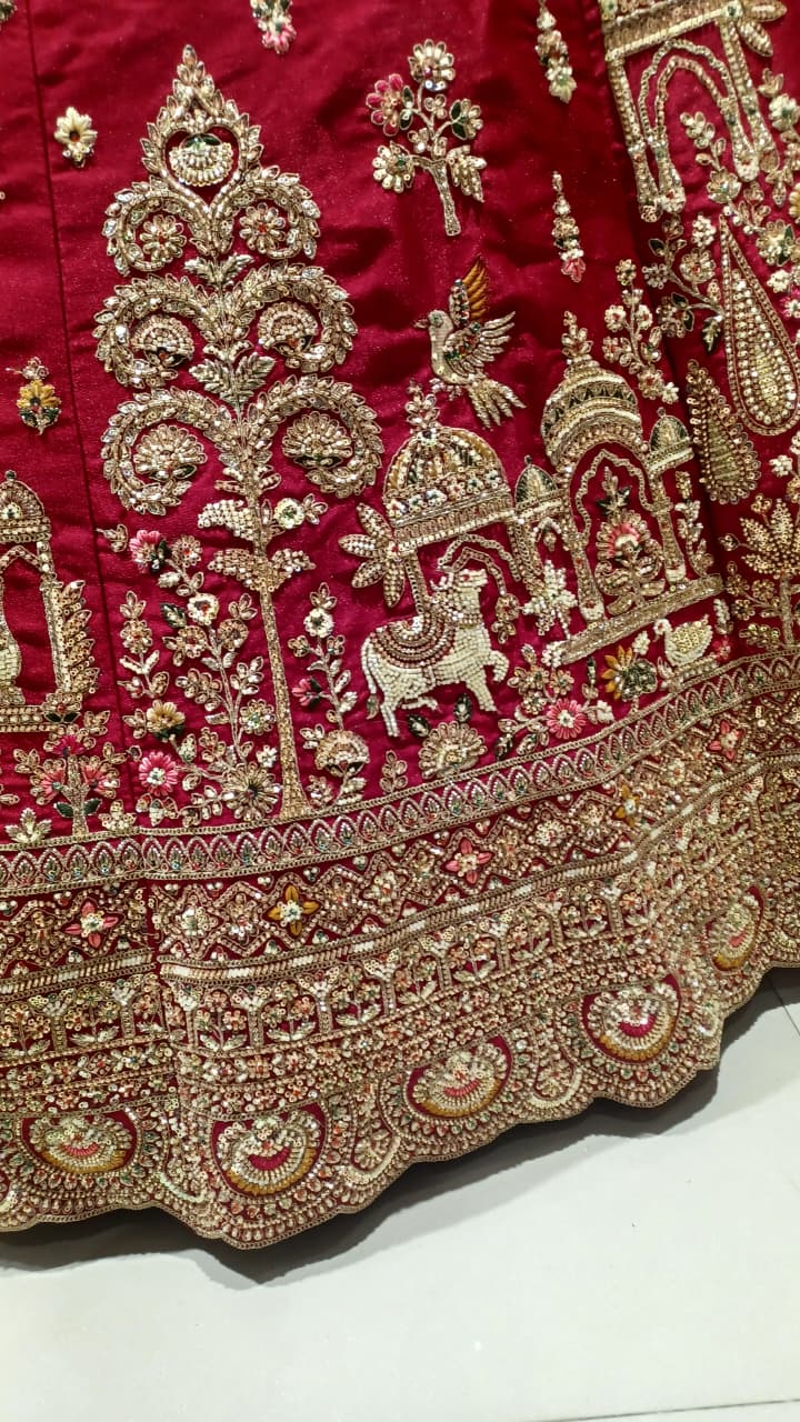 Premium Fuchsia-Maroon Bridal Lehenga with Detailed Scalloped Borders.