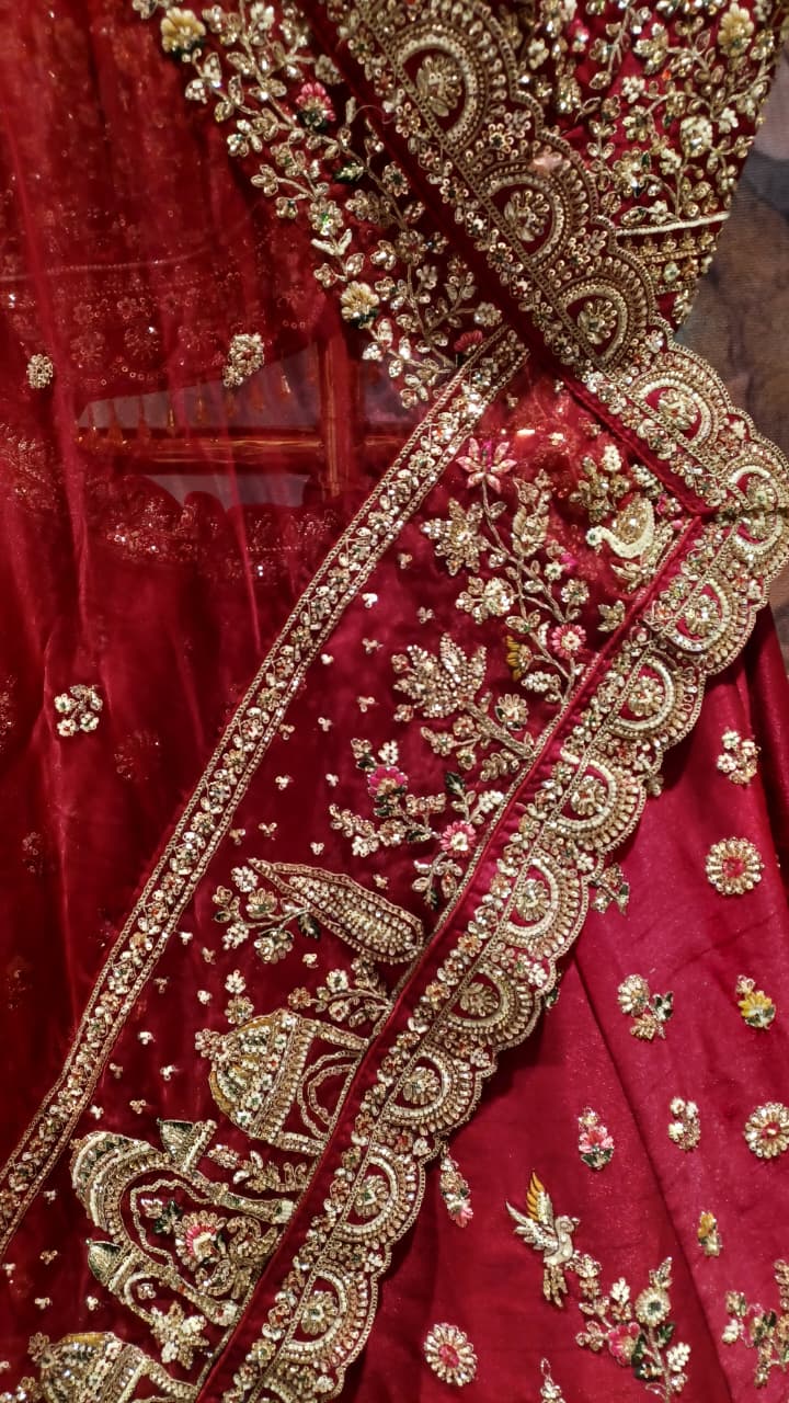Premium Fuchsia-Maroon Bridal Lehenga with Detailed Scalloped Borders.