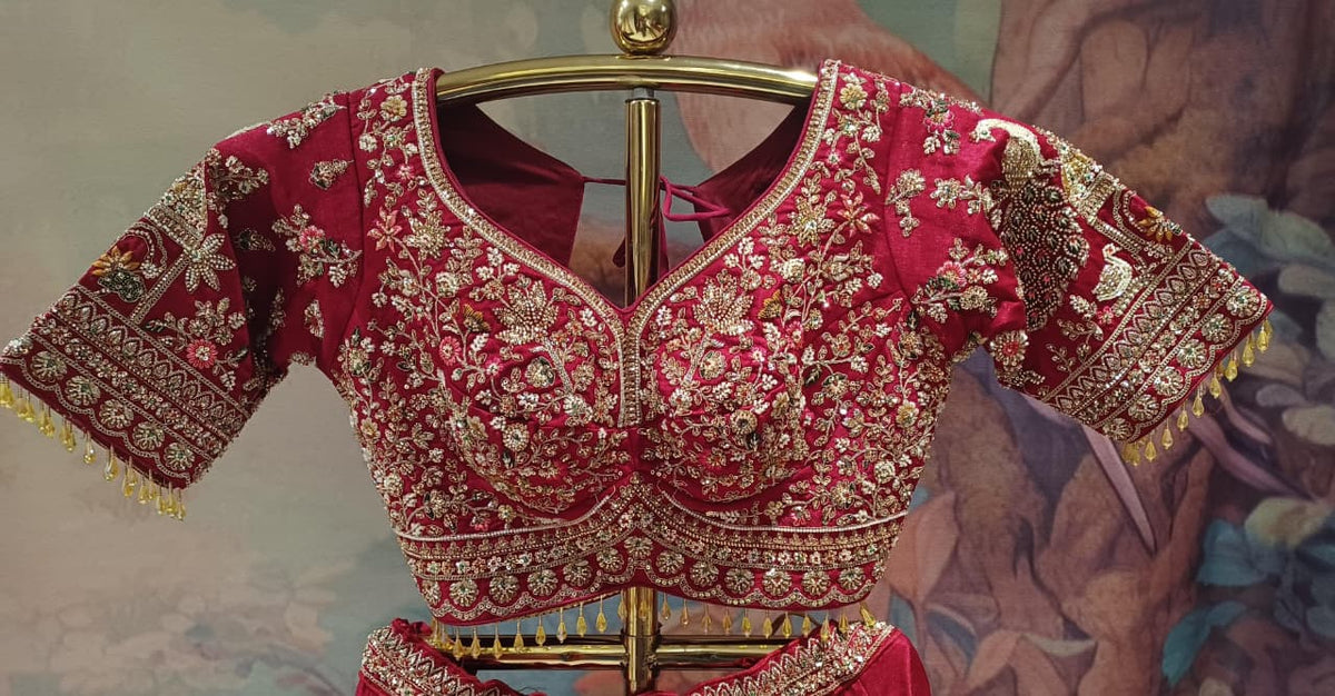 Premium Fuchsia-Maroon Bridal Lehenga with Detailed Scalloped Borders.