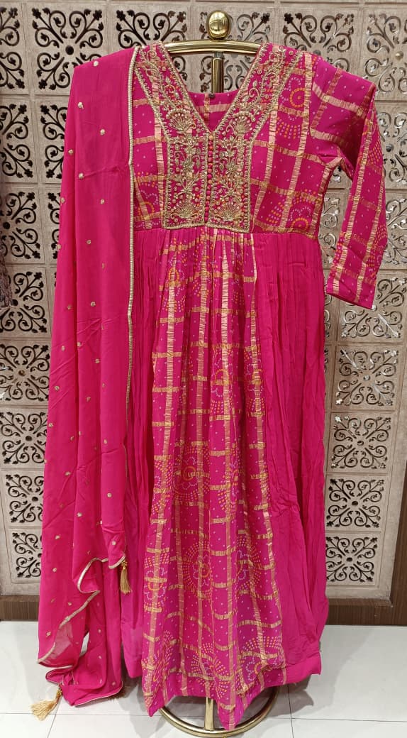 Rani Pink Bandhani & Checkered Flared Georgette Gown With Duppata.