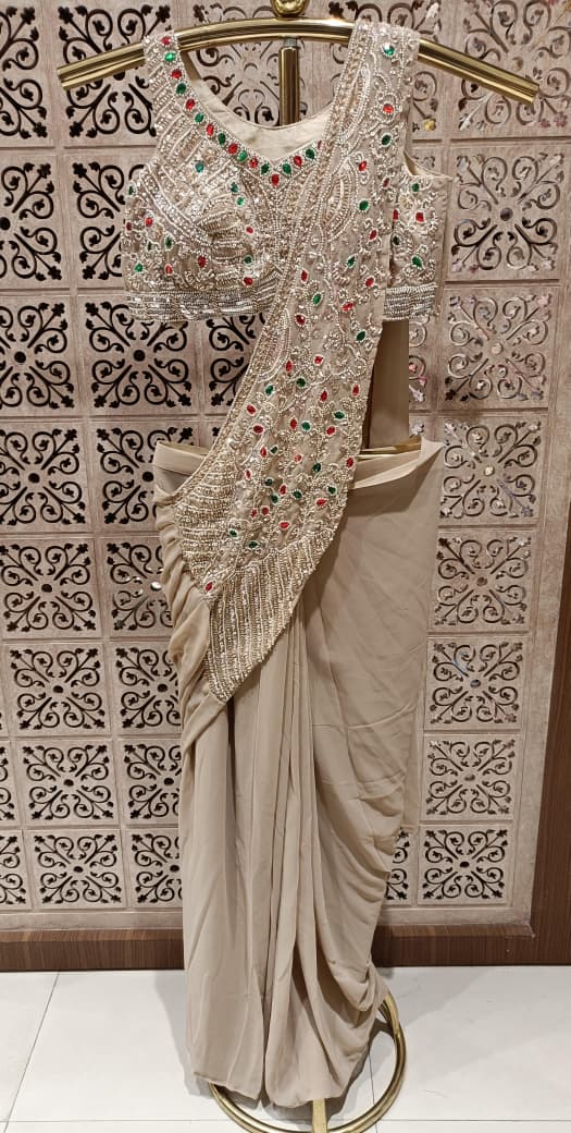 Beige Georgette Ready-to-Wear Saree with Multi-Hued Stone Embroidered Pallu.