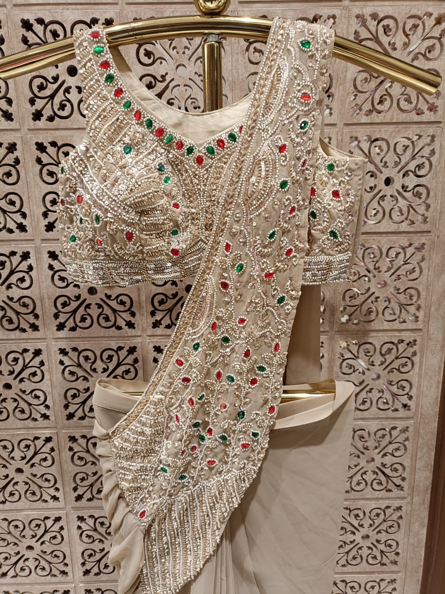 Beige Georgette Ready-to-Wear Saree with Multi-Hued Stone Embroidered Pallu.