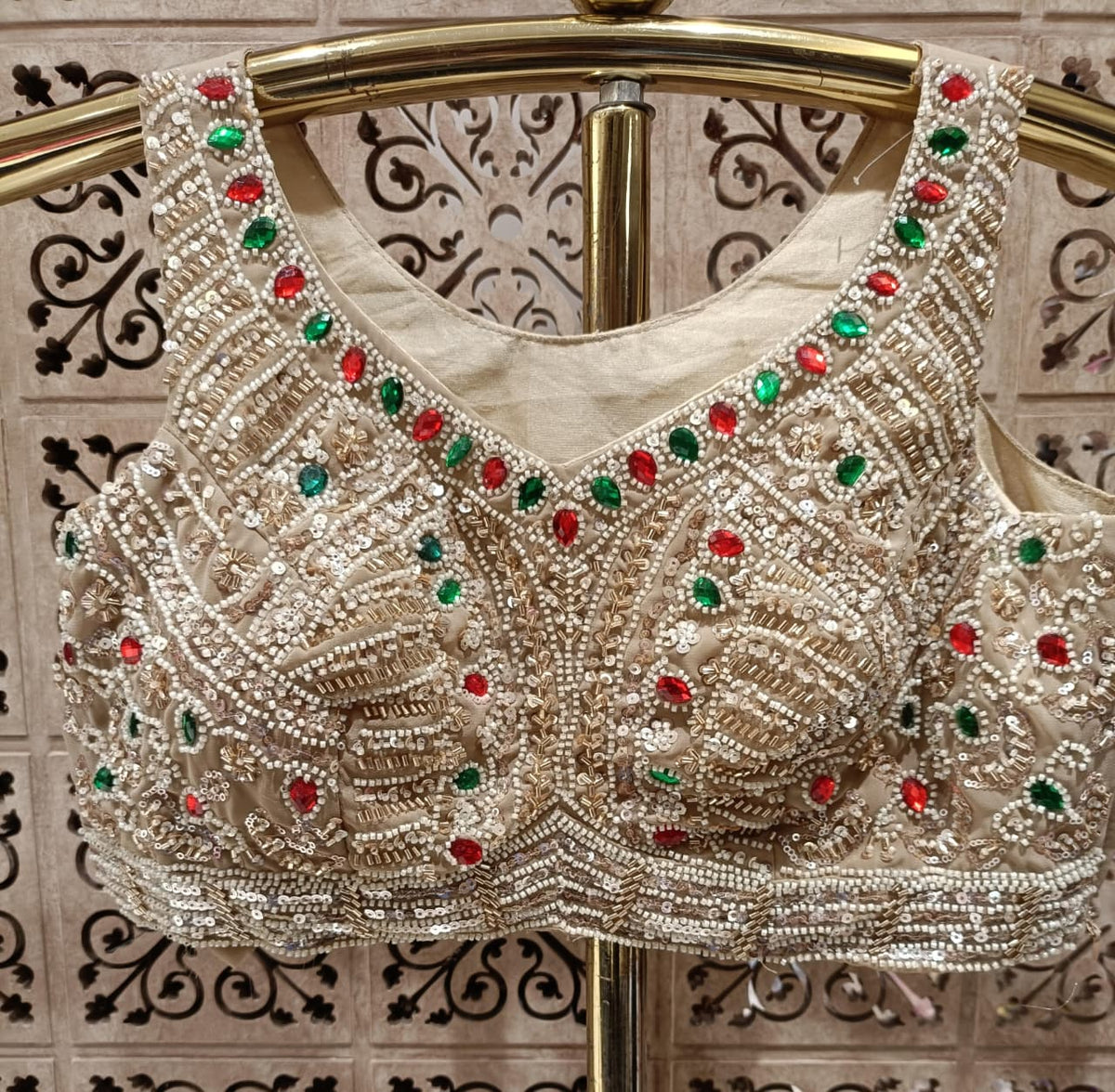 Beige Georgette Ready-to-Wear Saree with Multi-Hued Stone Embroidered Pallu.