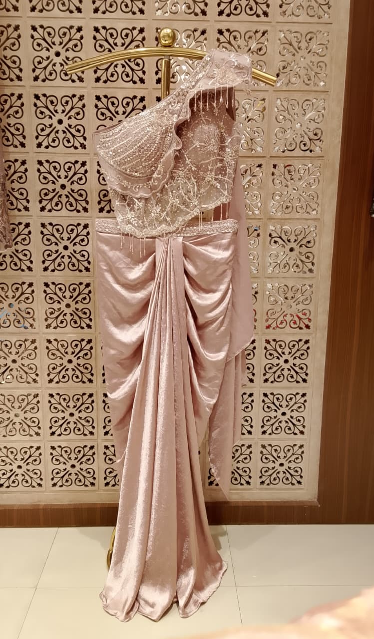 Rose Gold One-Shoulder Ready-to-Wear Crap Satin Saree with Ruched Dhoti Drape.