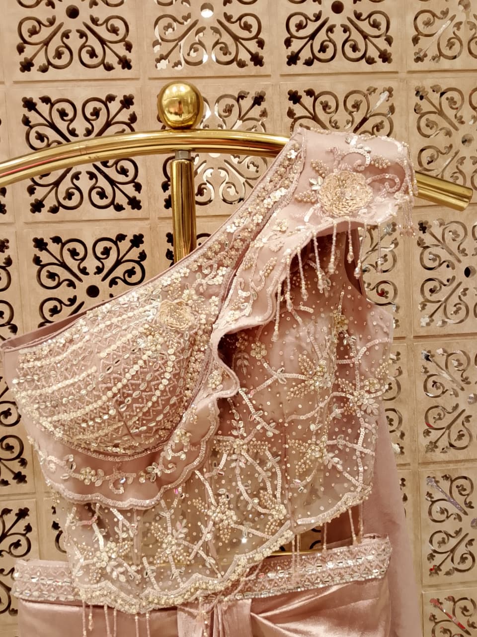 Rose Gold One-Shoulder Ready-to-Wear Crap Satin Saree with Ruched Dhoti Drape.