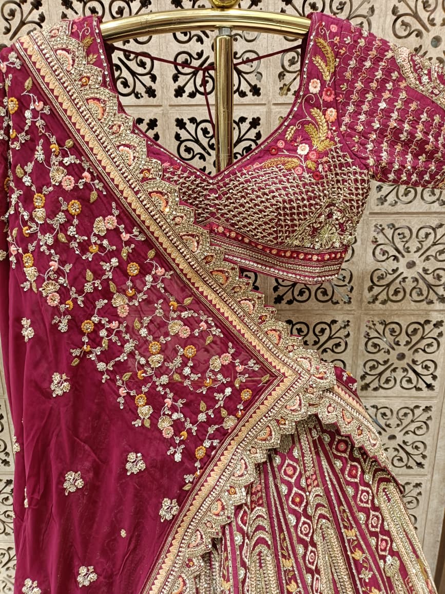 Rani Pink Royal Raw Silk Bridal Lehenga with Peacock and Kalash Zardosi Embroidery.