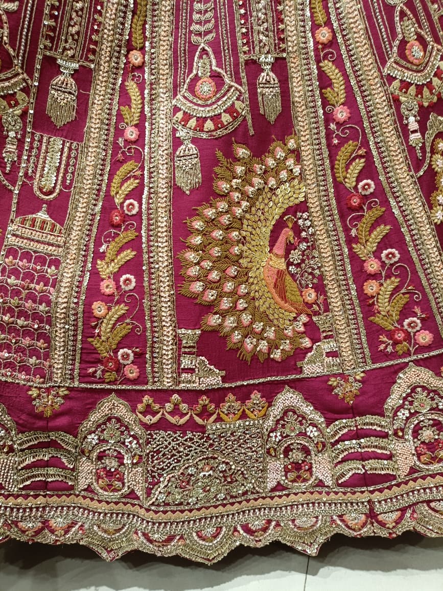 Rani Pink Royal Raw Silk Bridal Lehenga with Peacock and Kalash Zardosi Embroidery.
