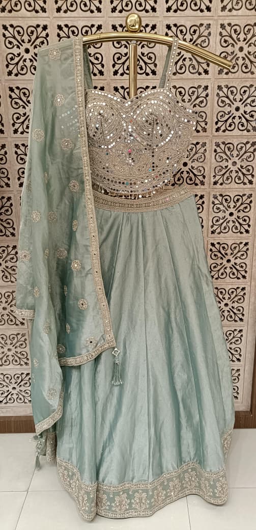 Sage Green Simmer Silk Lehenga Choli Set with Mirror Work.