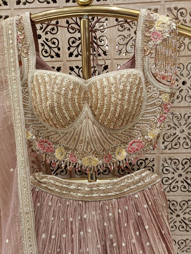 Blush Pink Crush Organza Lehenga Choli Set with Heavy Corset Blouse .