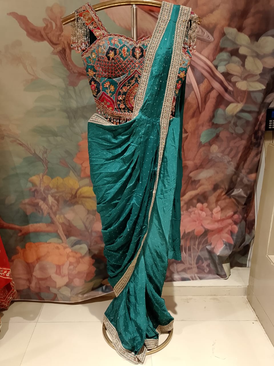 Teal Green Georgette Pre-Stitched Saree with Cold-Shoulder Fringe Blouse.