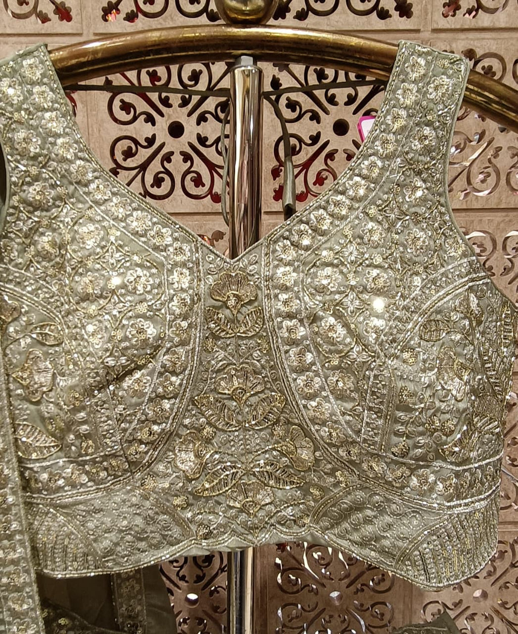 Sage Green Metallic Satin Silk Lehenga Choli Set with Floral Embroidery.