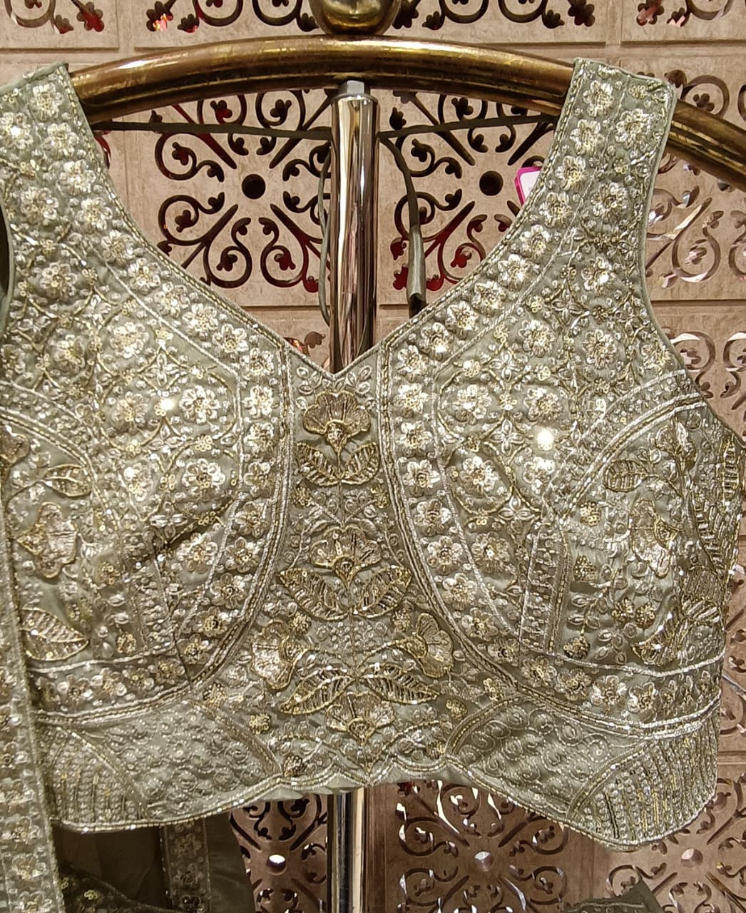 Sage Green Metallic Satin Silk Lehenga Choli Set with Floral Embroidery.