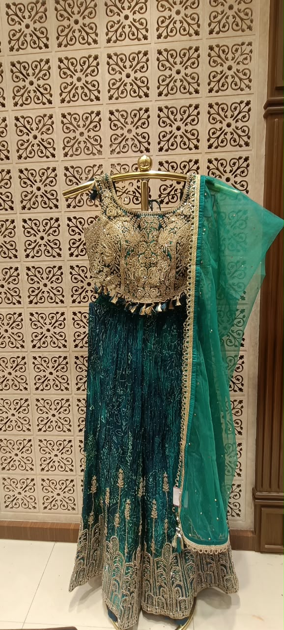 Emerald Green Satin Silk Lehenga Choli Set with Heavy Tassel Blouse.