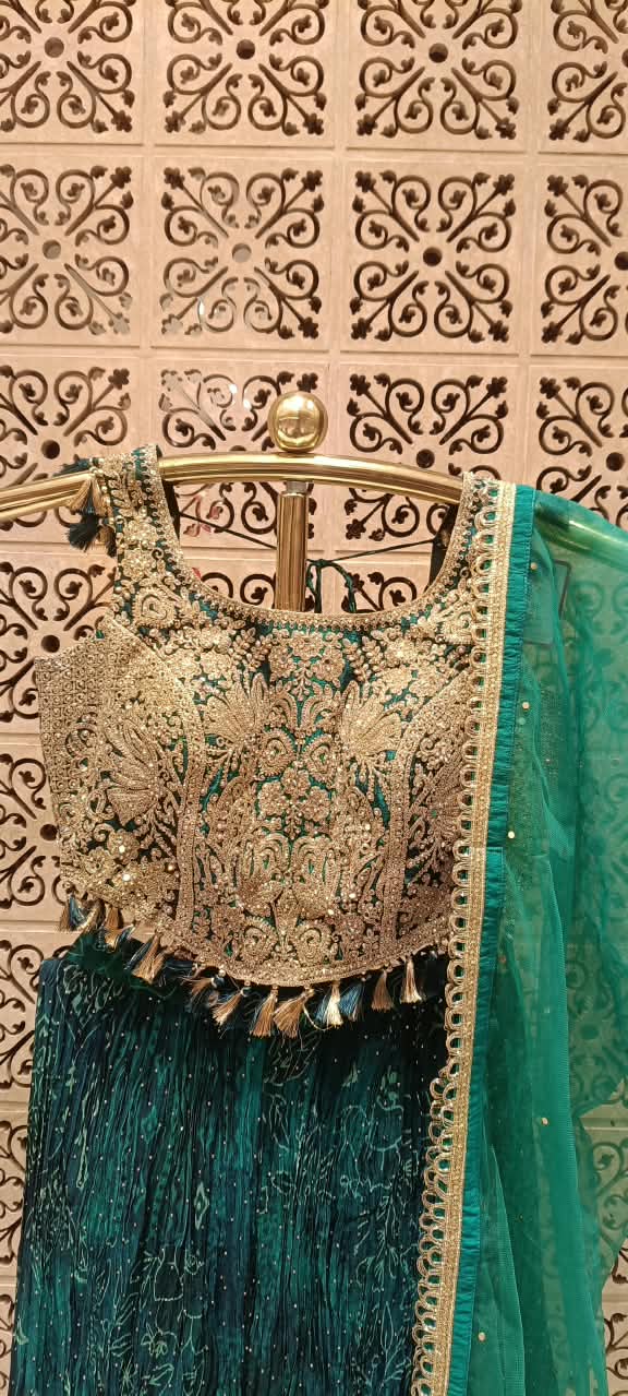 Emerald Green Satin Silk Lehenga Choli Set with Heavy Tassel Blouse.