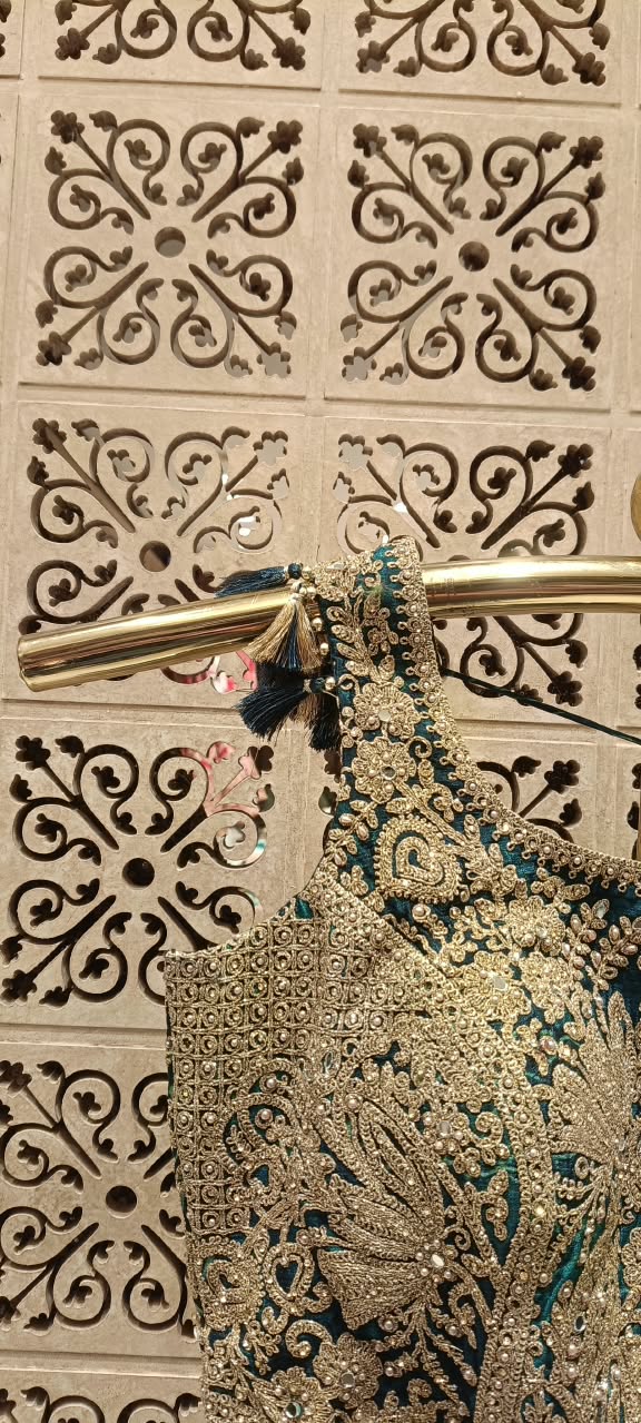 Emerald Green Satin Silk Lehenga Choli Set with Heavy Tassel Blouse.
