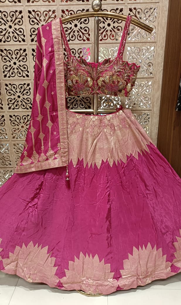 Three-piece luxury lehenga choli ensemble beautifully marries modern geometric design with traditional Indian opulence,