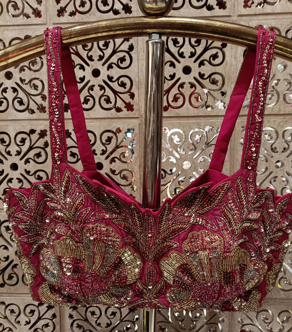 Three-piece luxury lehenga choli ensemble beautifully marries modern geometric design with traditional Indian opulence,