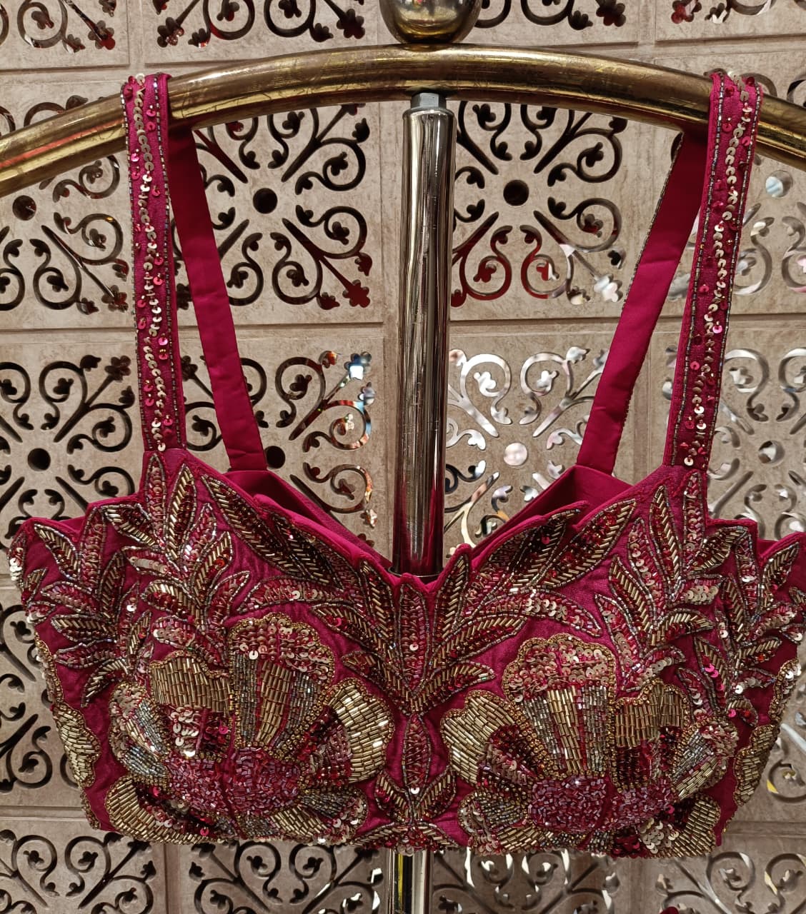 Three-piece luxury lehenga choli ensemble beautifully marries modern geometric design with traditional Indian opulence,