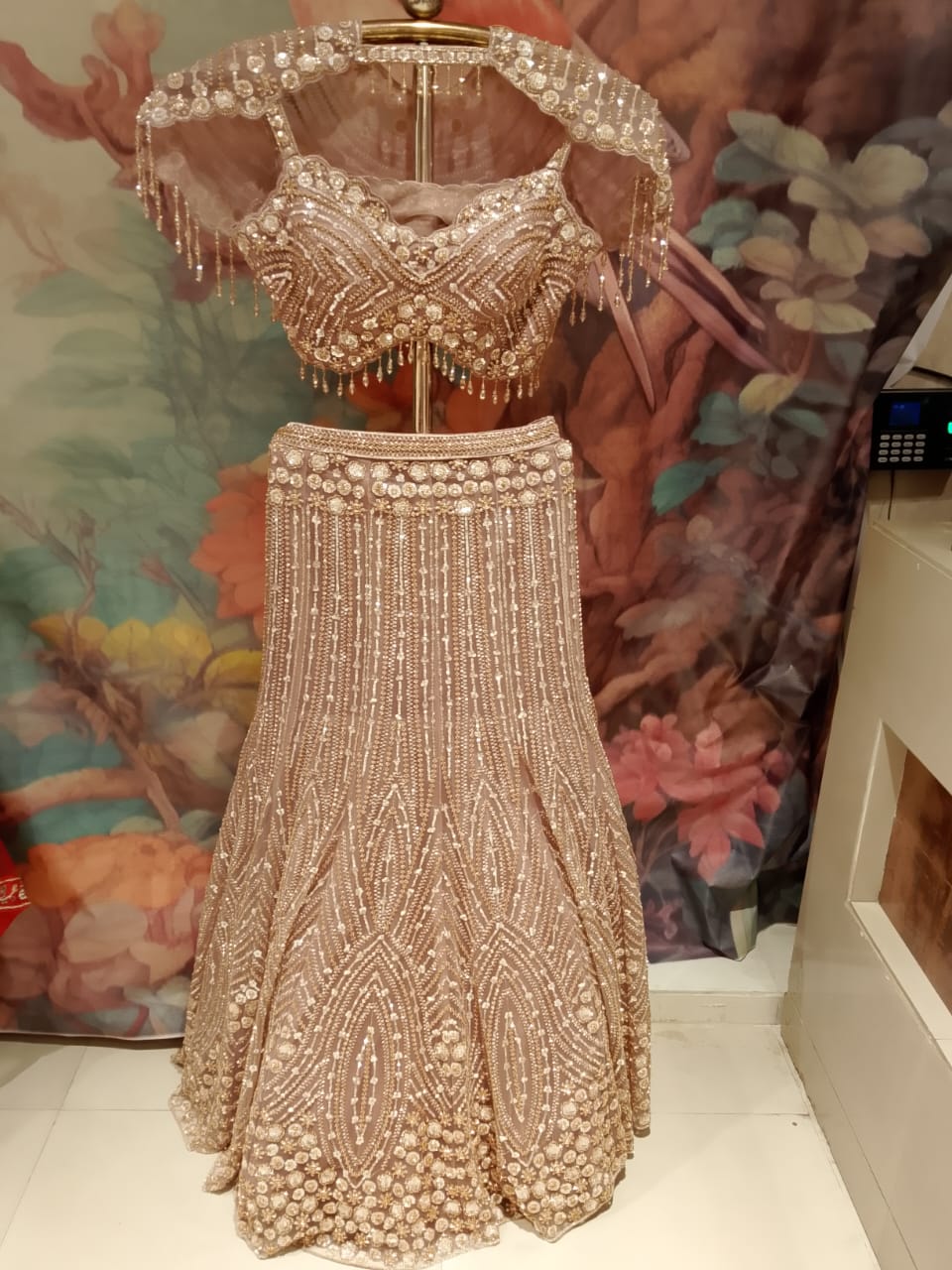 Champagne Gold Fish-Cut Net Lehenga Set with Pearl Fringe Blouse and Cape .