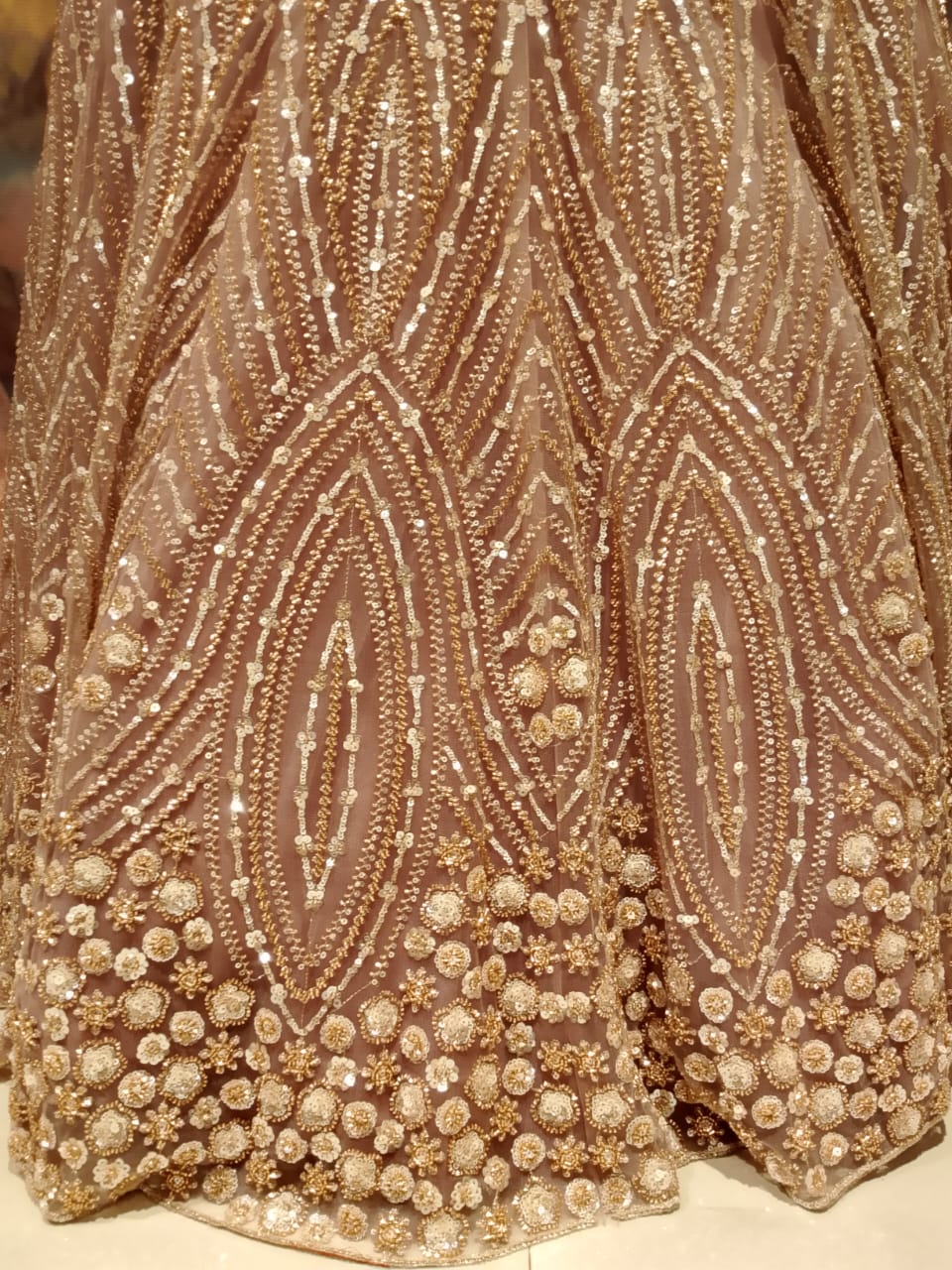 Champagne Gold Fish-Cut Net Lehenga Set with Pearl Fringe Blouse and Cape .