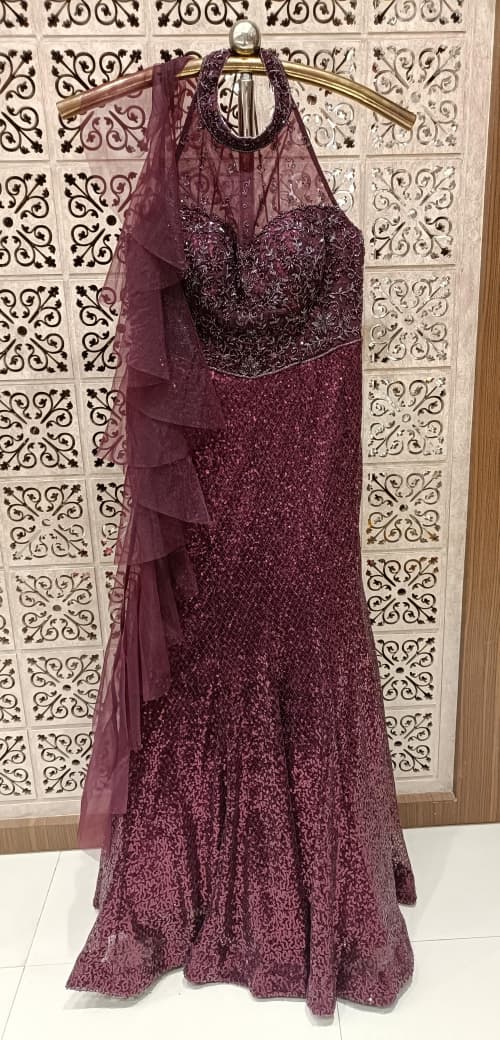 Wine Plum Red Sequined Fish-Cut Gown with Sheer Halter Neck and Cascading Ruffle Cape