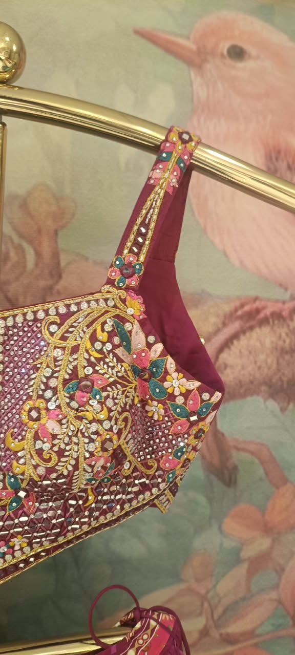 Three-Piece Jewel-Toned Patchwork Lehenga Choli Set.