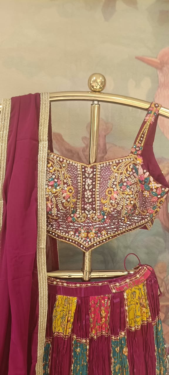Three-Piece Jewel-Toned Patchwork Lehenga Choli Set.