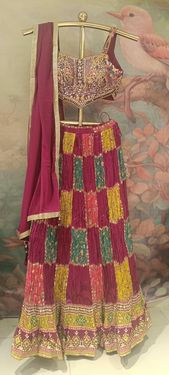 Three-Piece Jewel-Toned Patchwork Lehenga Choli Set.