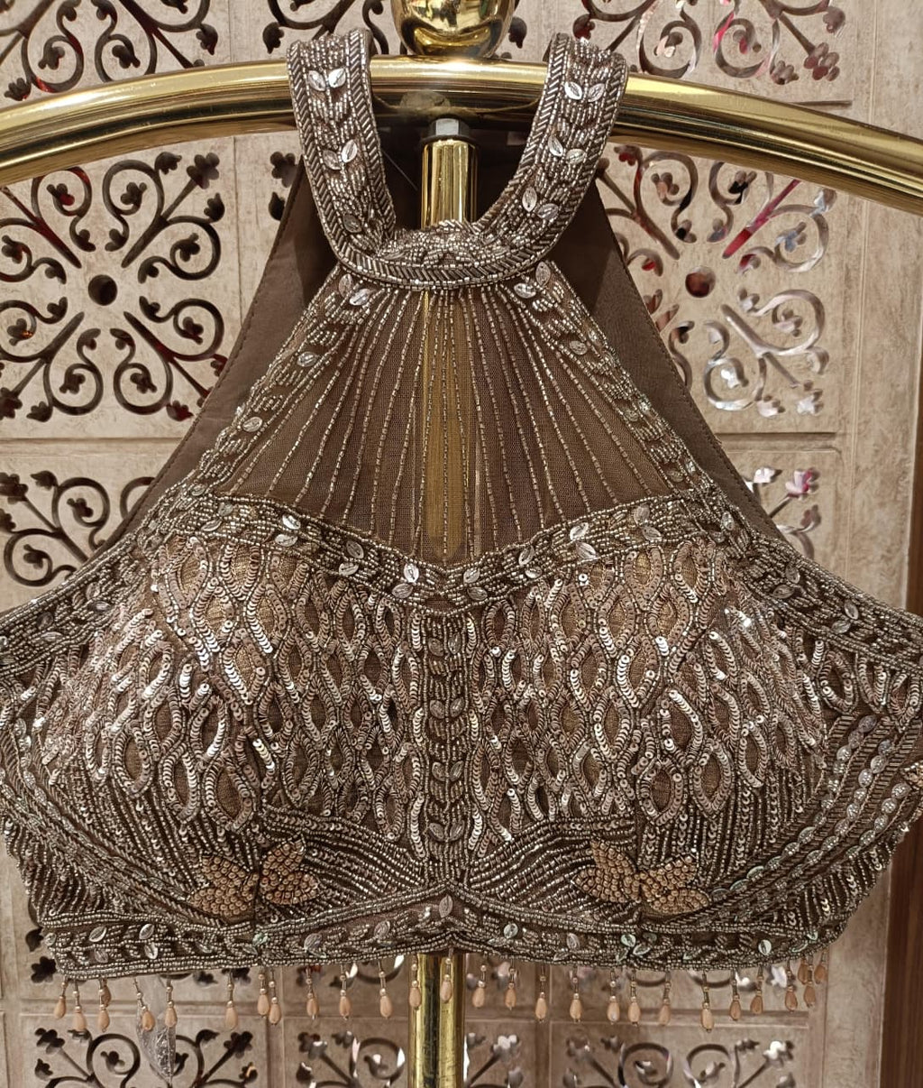 Metallic Bronze Shimmer Ready-to-Wear Saree with Heavily Embellished Halter Blouse.