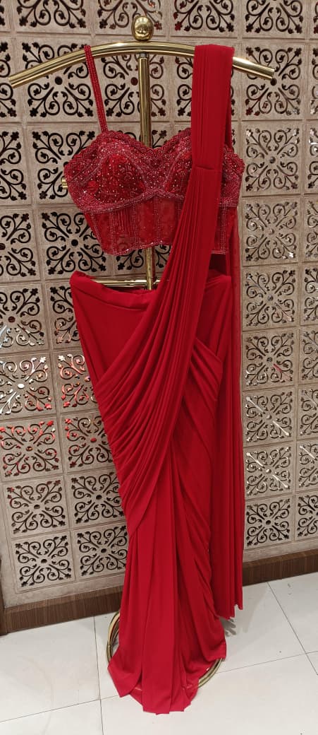Crimson Red Ready-to-Wear Saree, the ultimate blend of timeless elegance and effortless modern tailoring.