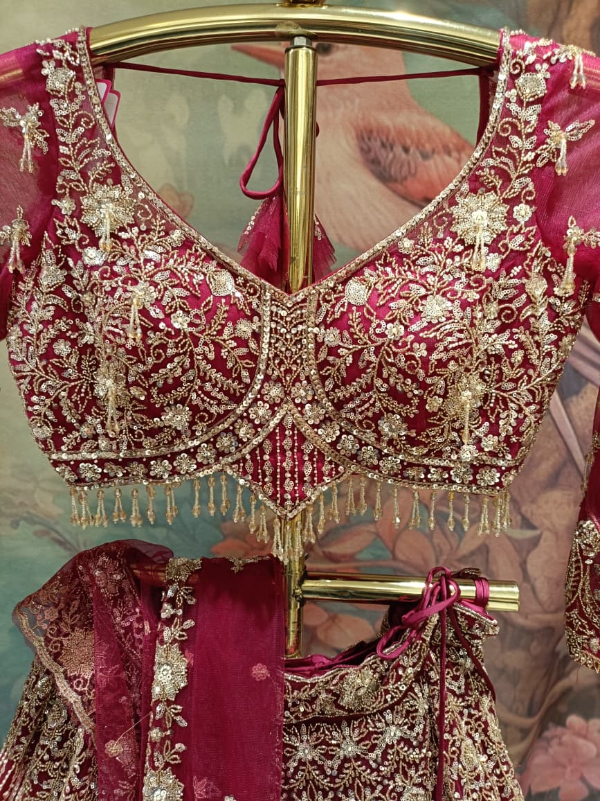 Magenta Pink Hand-Embroidered Bridal Lehenga Choli Set.