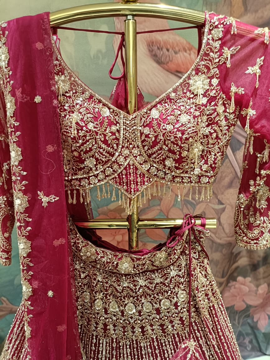 Magenta Pink Hand-Embroidered Bridal Lehenga Choli Set.