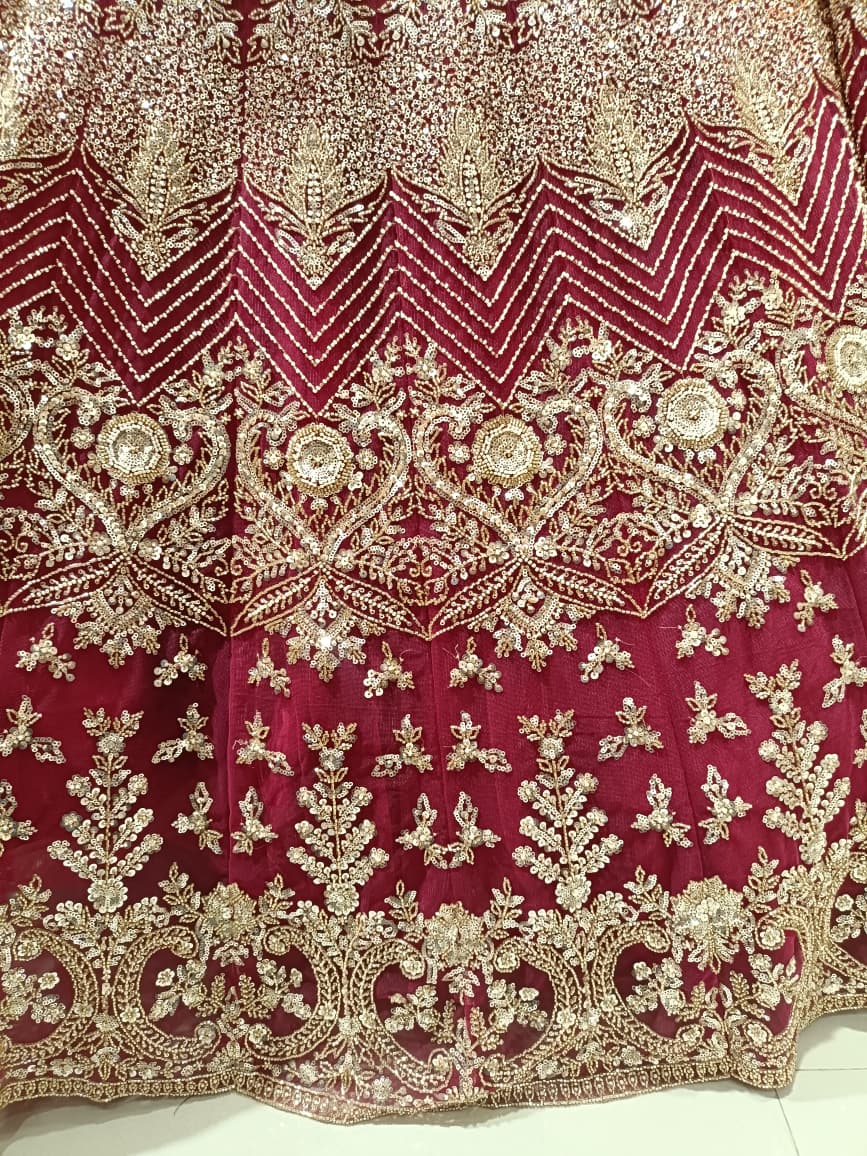 Magenta Pink Hand-Embroidered Bridal Lehenga Choli Set.