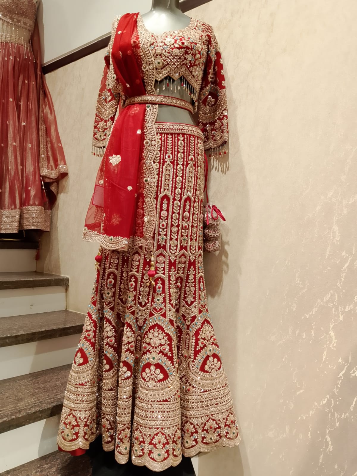 Crimson Red Net Fish-Cut Heritage Bridal Lehenga Choli Set.