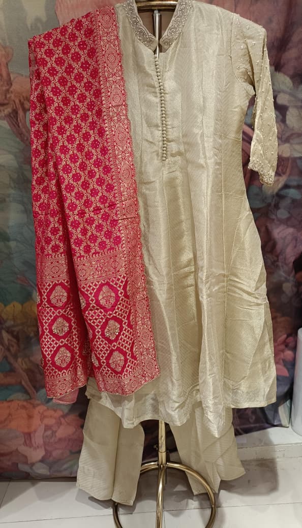 Regal Ivory-Gold Hand-Embroidered Simmer Silk Anarkali Set with Banarasi Dupatta.