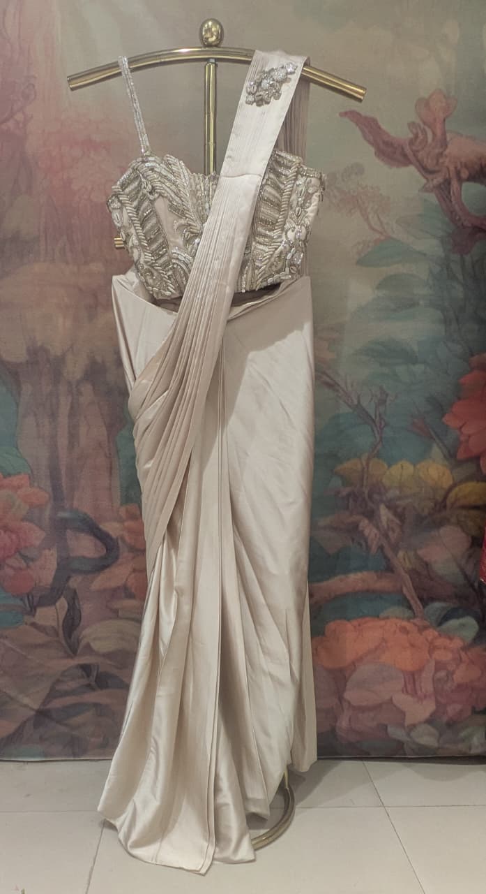 Champagne Beige Ready-to-Wear Saree, designed for the modern trendsetter who values ultimate comfort without sacrificing high-octane glamour.