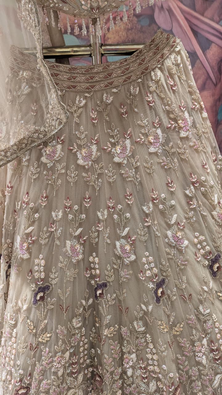 Champagne-Beige Floral Meadow Bridal Lehenga Choli Set.